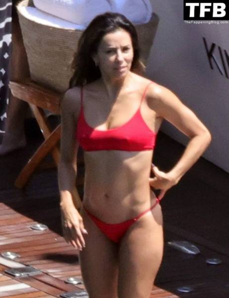Eva Longoria Showcases Her Stunning Figure and Ass Crack in a Red Bikini on Holiday in Capri on adultfans.net