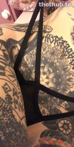 Grace Neutral tattooed goddess in bed on adultfans.net