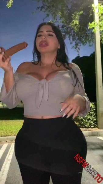 Crystal Lust - masturbating with a white dildo on public parking on adultfans.net