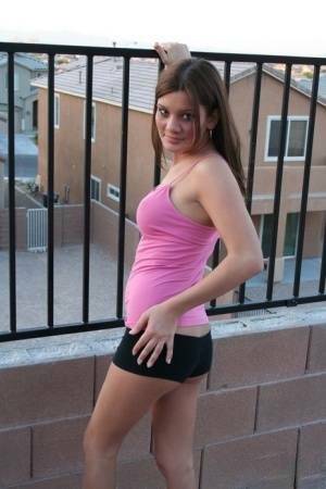 Solo girl Kate Crush strips naked on the balcony of condo complex on adultfans.net