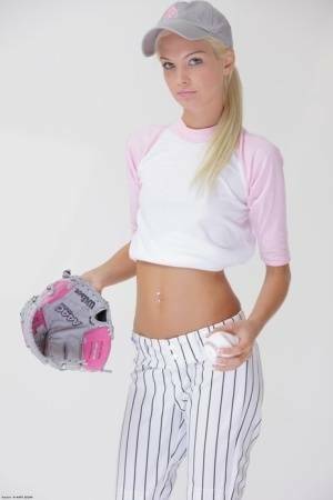 Baseball cutie Francesca loses her uniform to expose her skinny teen body on adultfans.net
