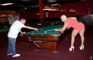 Curvy slut gets nailed on a pool table and jizzed over her big jugs on adultfans.net