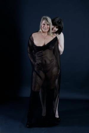 Older amateur Sweet Susi and her lesbian lover model naked together on adultfans.net