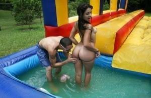 Frisky gals showing off their blowjob skills at the pool party on adultfans.net