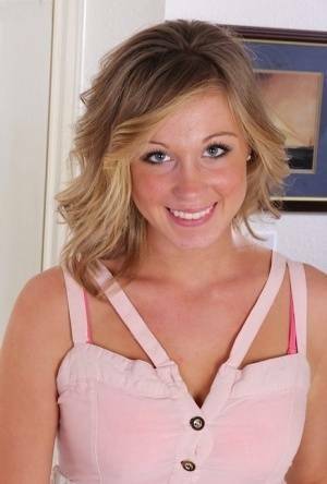 Smiling coed Ashley Jones gets naked for the very first time on adultfans.net