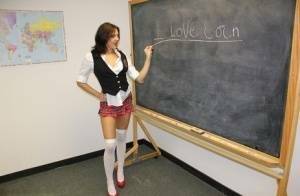 Naughty schoolgirl Cherry Poppins seduces a fellow student in slut wear on adultfans.net