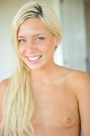 Sweet blonde teen plays with her labia lips before self fisting her pussy on adultfans.net