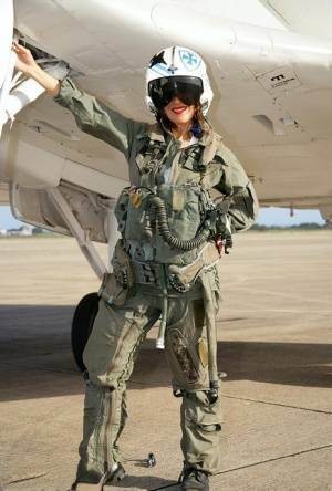 Sizzling mature babe Roni strips from military air force uniform on adultfans.net