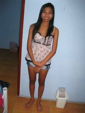 Stunning asian babe with shaved pussy gets undressed and slammed hardcore on adultfans.net