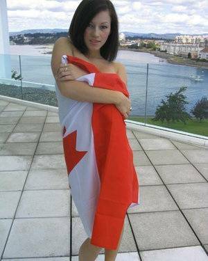 Teen amateur Kate wraps her naked body up in a Canadian flag on adultfans.net