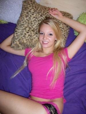 Cute teen girl with blonde hair shows off her tits and twat for the first time on adultfans.net