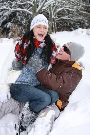Teen girl opens her mouth for a cumshot after fucking in the snow on adultfans.net