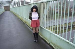 Amateur woman Barby Slut exposes herself in public while wearing black boots on adultfans.net