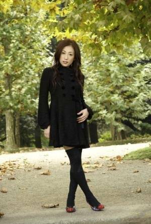 Fully clothed Japanese teen models in the park in black clothes and stockings - Japan on adultfans.net