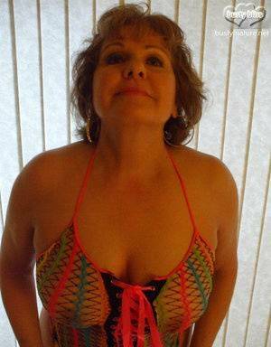 Mature woman Busty Bliss wears see thru attire during POV action on adultfans.net