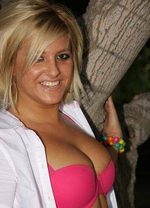 Blonde amateur Jenny works her firm ass and twat clear of jean shorts outdoors on adultfans.net