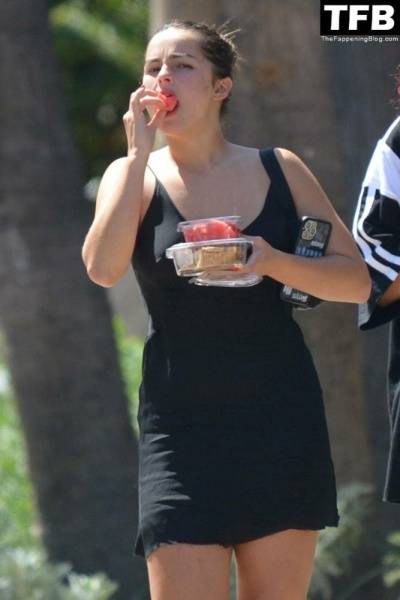 Addison Rae Indulges in Some Refreshing Watermelon While Out in a Tight Skirt with Her Boyfriend on adultfans.net