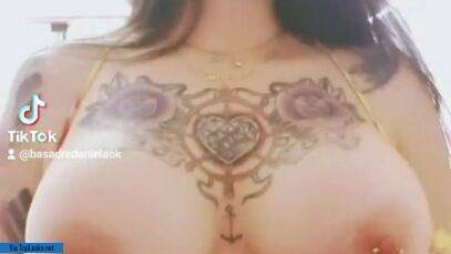 Topless sex model dances another TikTok trend with fake boobs on adultfans.net