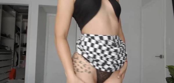 Beautiful curly bitch Xoleelee in a skirt posing for the camera on adultfans.net