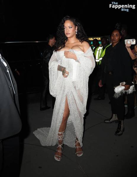 Rihanna Displays Her Curves in a White Dress (13 Photos) on adultfans.net