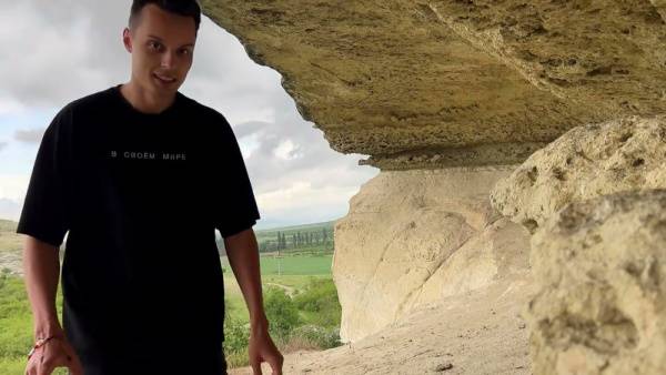 Brown-haired woman with big ass gets deep throat in rocky cave during hike on adultfans.net