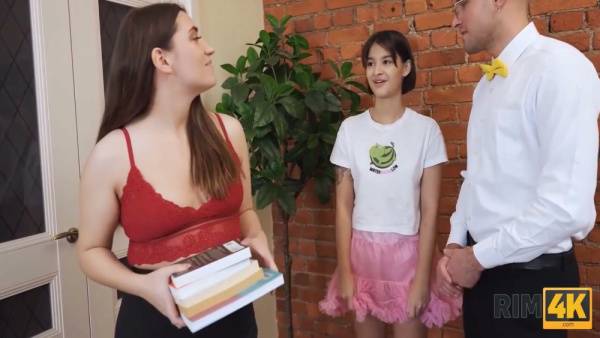 Two women and a bespectacled man explore rimming during a school-themed encounter - Russia on adultfans.net