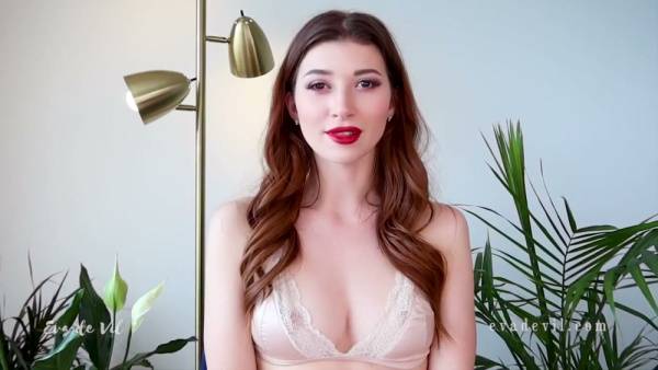 Brown-haired solo girl falls into trance while teasing her own cleavage on webcam on adultfans.net