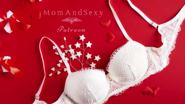 Voluptuous MILF teases in red lace lingerie with garters and stockings on adultfans.net