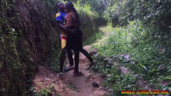 Dark-skinned woman in floral dress takes her lover in missionary position during forest encounter - India on adultfans.net