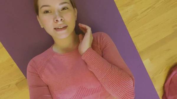 Young teen stretches into intimate yoga poses on her purple mat on adultfans.net