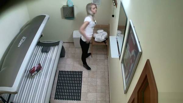 Blonde Czech girl caught on hidden cam stripping in a public solarium - Czech Republic on adultfans.net