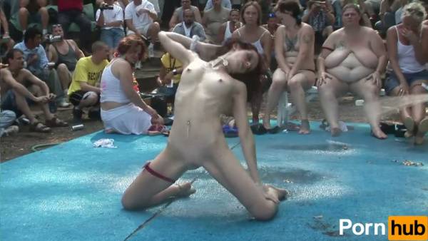 Real nudist party under the sun with dancing and exhibitionism on full display on adultfans.net