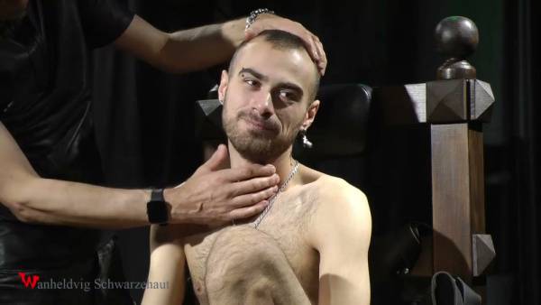 Submissive man masked and electrified on a bondage chair on adultfans.net