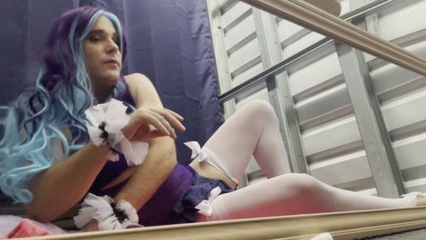 Feminine sissy in frilly purple dress and white stockings pleasures herself on adultfans.net