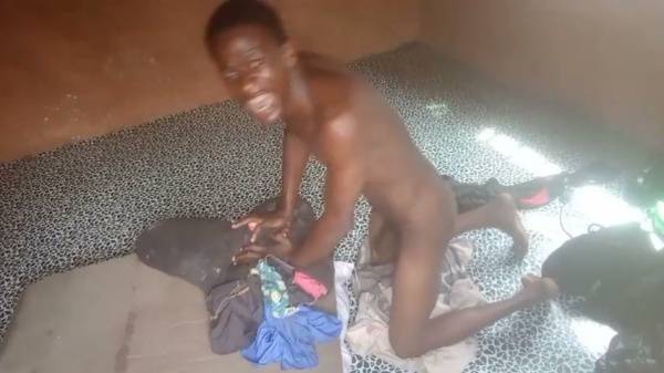 Muscular dark-skinned man poses nude on a leopard-print floor in natural light on adultfans.net