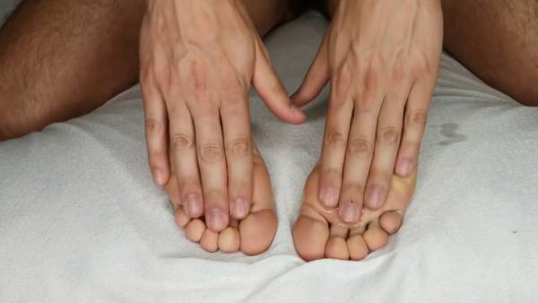 Oil massage turns into a passionate footjob with cumshot on soles on adultfans.net