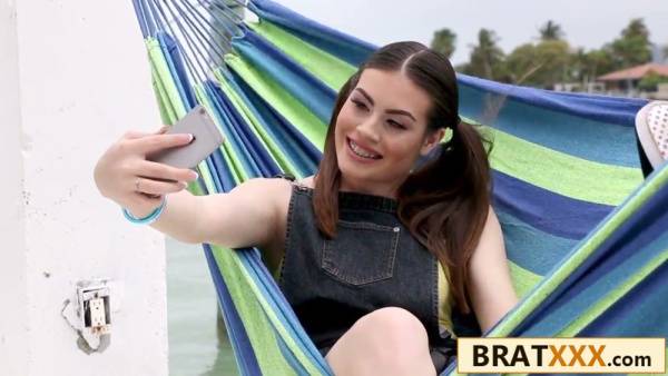 Pigtailed brunette teen with glasses practices on a banana before riding big cock on adultfans.net