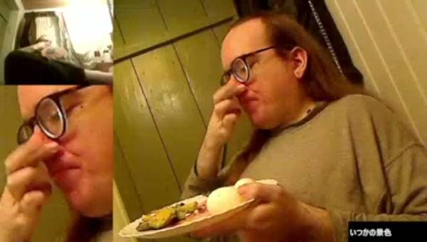 Woman eats a meal in a cozy wooden room on adultfans.net