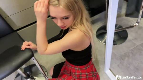Long-haired blonde girlfriend goes down on her muscular boyfriend in the kitchen on adultfans.net