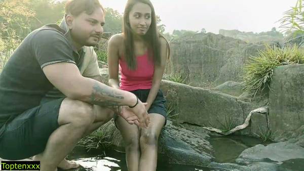 Indian couple shares intimate moments on bare rock by a forest waterfall - North Korea - India - Japan - Egypt on adultfans.net