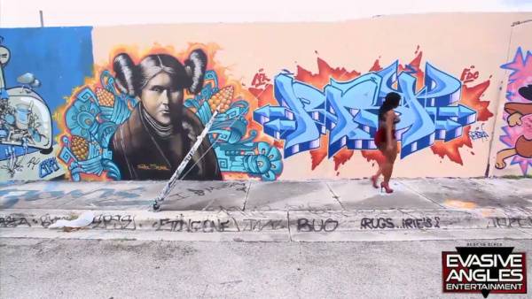 Mia Milan meets Roland at the graffiti wall and takes his BBC deep in the tub on adultfans.net