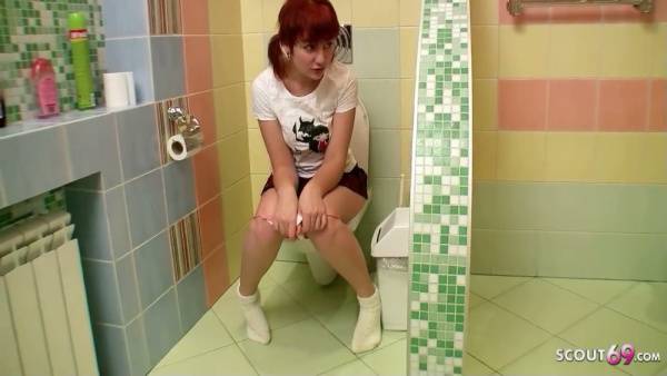 Slender redhead enjoys intimate bath time with a dark-haired man in a vibrant tiled bathroom - Germany on adultfans.net