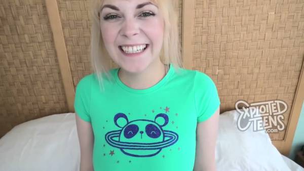 Blonde amateur faces the camera in a candid casting session on adultfans.net