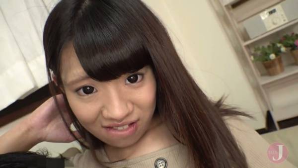 Young Japanese woman fingers herself on the couch as he touches her breast - Japan on adultfans.net