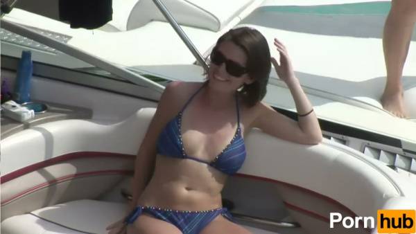Blonde college girl exposes her natural tits and pussy during a wild boat party on adultfans.net