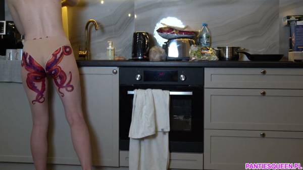 Nude American housewife with octopus tattoo cooks dinner in modern kitchen - Usa - Germany on adultfans.net
