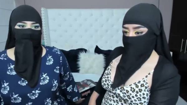 Two masked Arab women share an intimate lesbian cam session on adultfans.net