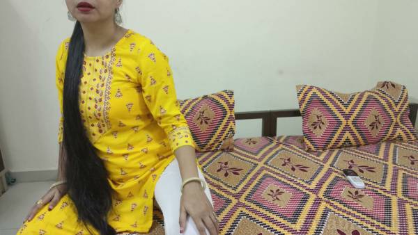 Two Indian women in traditional dress explore each other passionately on bed and kitchen counter - India on adultfans.net
