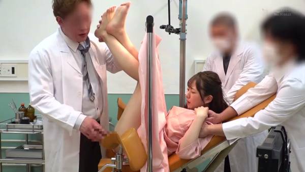 Young Japanese patient overwhelmed by multiple doctors during a gynecological exam - Japan on adultfans.net