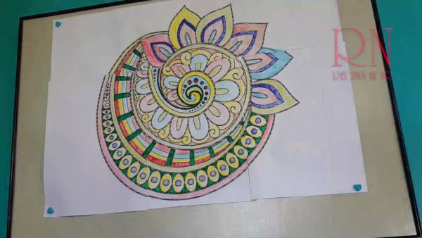 Nude woman in tranquil art session creates intricate mandala on turquoise wall - India on adultfans.net